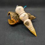 pendule de radiesthésie en bois d'abricotier. Fait main en tournage sur bois à Royan