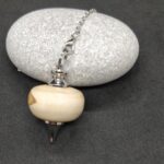 pendule broche olivier