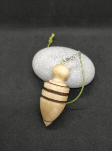 Pendule DRUIDE en bois d'olivier