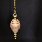 Pendule de radiesthésie artisanal en mirabellier et métal