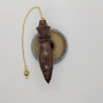 Pendule artisanal égyptien en bois de rose
