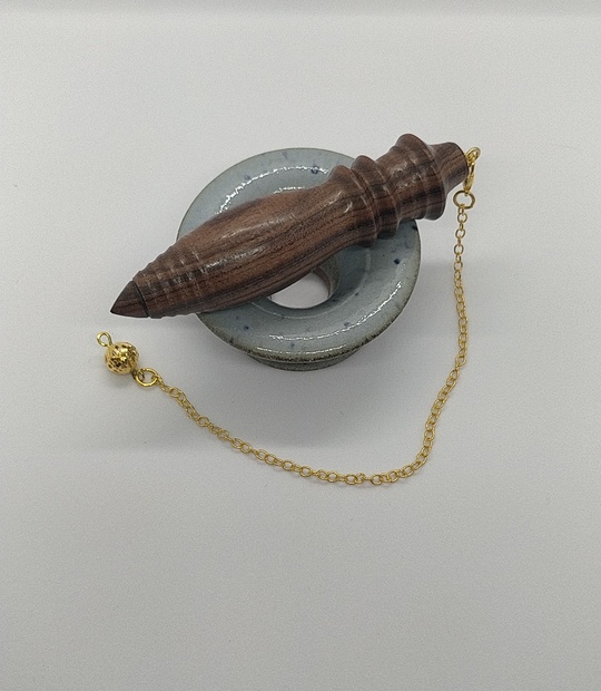 Pendule artisanal égyptien en bois de rose