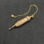 Pendule artisanal de radiesthésie en abricotier - métal