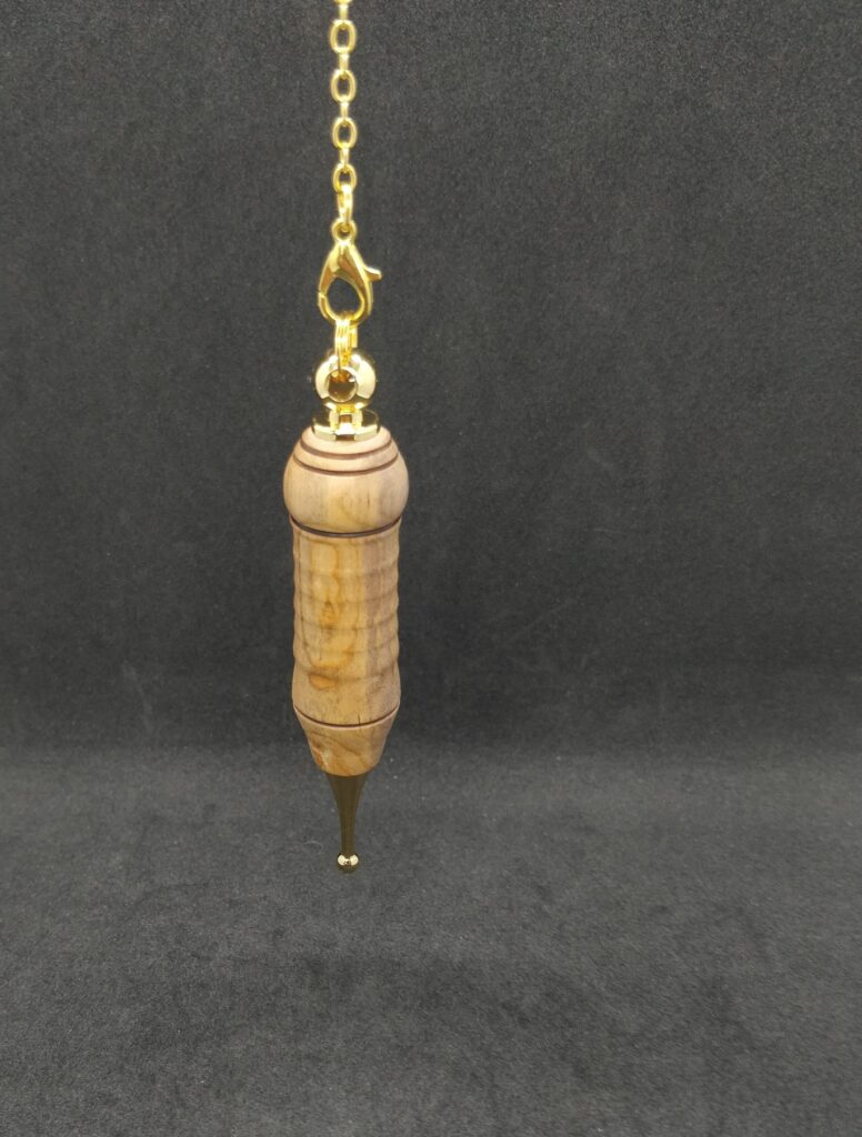 Pendule artisanal de radiesthésie en abricotier - métal