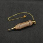 Pendule artisanal de radiesthésie en abricotier - métal